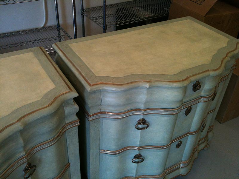 Custom furniture finish with gold metallic detail.