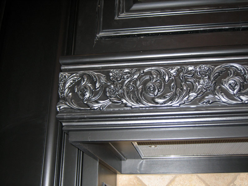 Black lacquer cabinet finish with metallic pewter highlights.